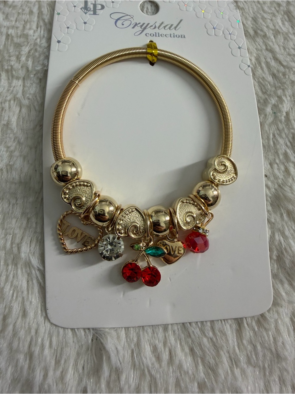 Gold-Tone Charm Bracelet with Red Cherry and Crystal Accents -